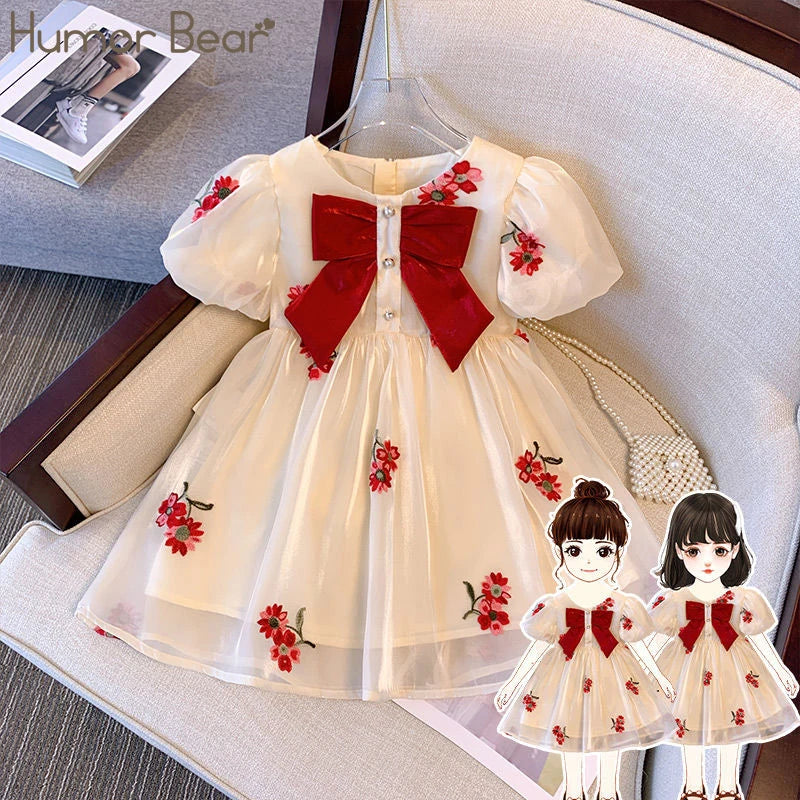 Vestido infantil de tul con manga abullonada