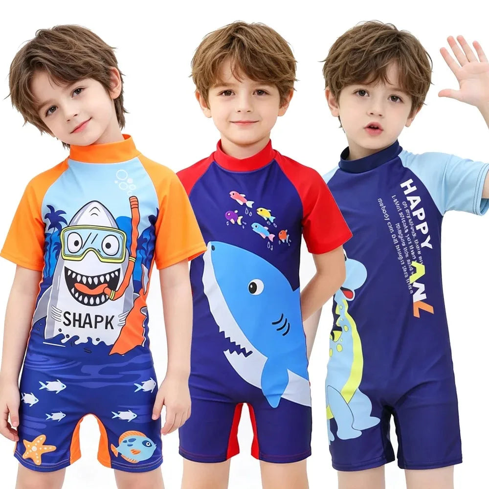 Traje de baño infantil con tiburón y pingüino